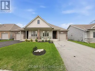 Spacious and inviting 3-bedroom home featuring beautiful new granite countertops, a bright screened-...