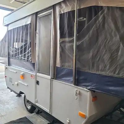 Fridge, Stove, Sink Convertible bed from table and sofa, 12'x8' awning Pull out both ends. Perfect c...
