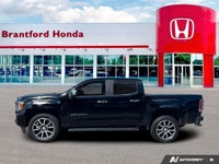Command the road with this 2021 GMC Canyon Denali Crew Cab, boasting a powerful 3.6L V6 engine deliv... (image 1)