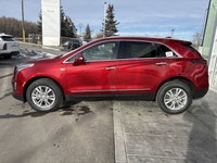 AMVIC LICENSED DEALER The 2026 Cadillac XT5 Luxury AWD, finished in Radiant Red Tintcoat with a refi... (image 4)
