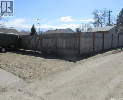 Great lot to build on or use for storage. Lot is approximately 50x114 ft, fully fenced, with the 12x...