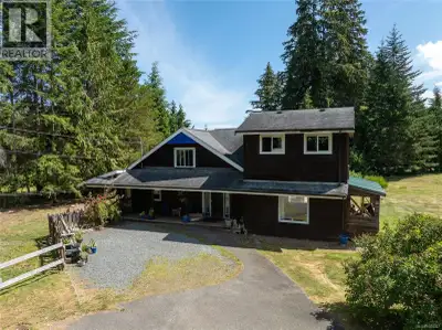Welcome to the ultimate North Island farmhouse! This unique, custom-built home is situated on just u...