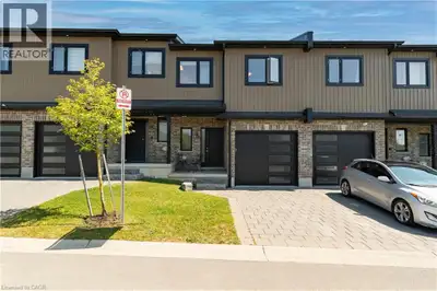 Welcome to Unit 18 at 811 Sarnia Road, a beautifully upgraded townhome fronting onto peaceful green...