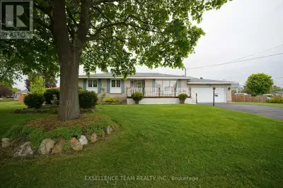 Welcome to this charming very well maintained 1360 sq ft bungalow with double car attached garage &...
