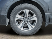 Experience the versatility and comfort of the 2018 Honda CR-V LX AWD in a sophisticated gray finish,... (image 3)
