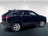 Introducing the 2024 Dodge Hornet GT AWD, a dynamic SUV that commands attention with its black-on-bl... (image 4)