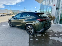 This 2024 Lexus UX 250h Premium presents a strong expression of its crossover qualities, with a bold... (image 1)