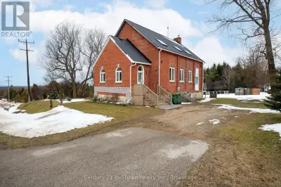 Endless possibilities await in this charming converted school house, nestled on a 0.83 acre lot with...
