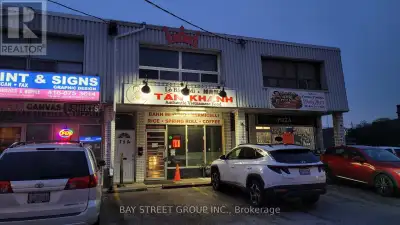 Bright and versatile second-floor commercial space featuring four private rooms, a kitchen, and a wa...
