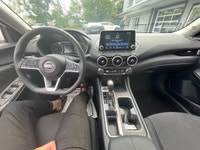 The 2023 Nissan Sentra SV CVT in pristine White is a front-wheel-drive sedan that handles beautifull... (image 8)