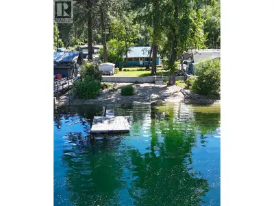Welcome to lakefront living at its finest in beautiful Christina Lake! This rare .302-acre waterfron...