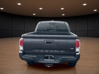 The 2023 Toyota Tacoma TRD Sport V6 in stunning gray is ready to tackle any terrain with its robust... (image 6)