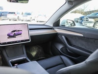Experience the epitome of modern driving with the 2023 Tesla Model 3 Long Range AWD in a stunning Wh... (image 9)