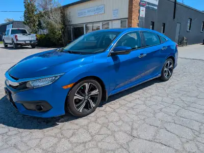 Fully loaded Honda civic Touring model Navigation Sunroof Back up cam We finance good and bad credit...