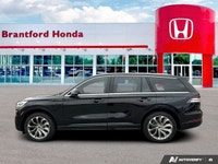 Recognized with an IIHS Top Safety Pick award, the 2022 Lincoln Aviator Grand Touring in elegant Bla... (image 1)