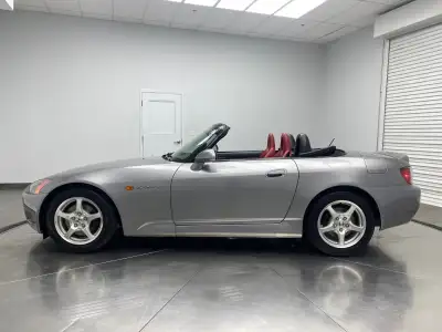 Super clean all stock first year 2000 Honda S2000 Roadster with a clean CarFax history report and is...