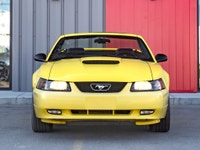 Carget Supercentre is proud to present this 2003 Ford Mustang GT Convertible! EXTERIOR: ZINC YELLOW... (image 1)