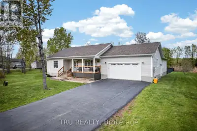 THE ULTIMATE MULTI GENERATIONAL OPPORTUNITY! Two spacious homes all on one level! This 2011 quality...