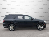 Equipped with comforting heated front seats and a heated steering wheel, this 2021 Dodge Durango SXT... (image 6)