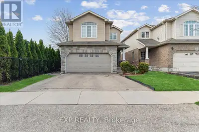 This beautifully maintained home features outstanding curb appeal with a stone front elevation, bric...