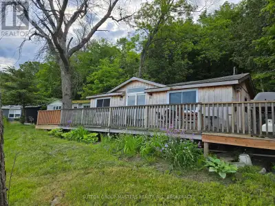 Here's your dream cottage getaway! Gorgeous from the outside, with stunning redwood cedar board and...