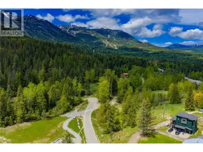 Build your dream mountain retreat on this exceptional sun-filled lot located just moments from the b...