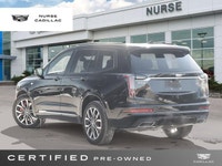 The 2025 Cadillac XT6 AWD Sport, dressed in a sophisticated Stellar Black Metallic exterior and a lu... (image 3)