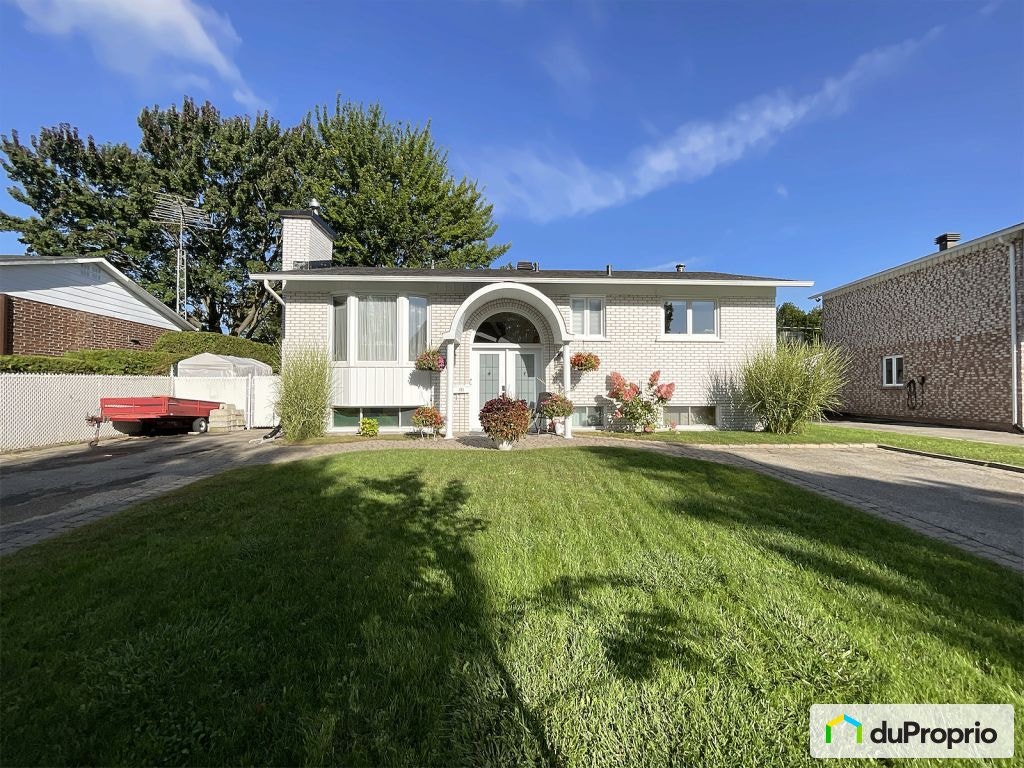$590,000 - Bungalow for sale in St-Eustache — photo 1