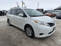 This 2014 Toyota Sienna LE in classic white is a proven, family-friendly minivan known for outstandi... (image 6)