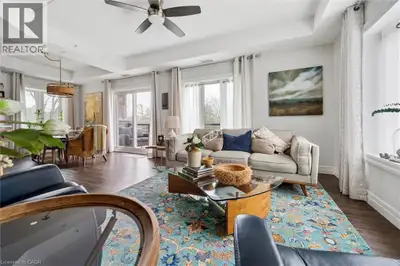 Welcome to this stunning, light filled end unit condo offering 1200+ square feet of beautifully desi...