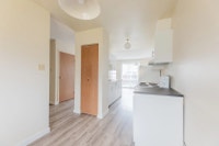 Amenities: Upgraded Kitchens • In-suite Laundry • Dishwasher Suite & Building: Two level, three-bedr... (image 5)