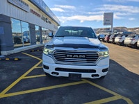 For a quick response please text 403-820-9940. AMVIC licensed business The 2022 Ram 1500 Limited Lon... (image 1)
