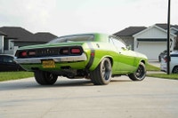 This 1974 Dodge Challenger Pro-Touring build is a standout creation. A gem for fellow car enthusiast... (image 5)