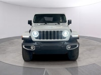 Experience the rugged charm of the new 2026 Jeep Wrangler Sahara 4 Door 4x4 in a striking white fini... (image 7)