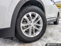 The 2020 Hyundai Santa Fe Essential 2.4L AWD in stunning white is a masterclass in all-wheel-drive p... (image 6)