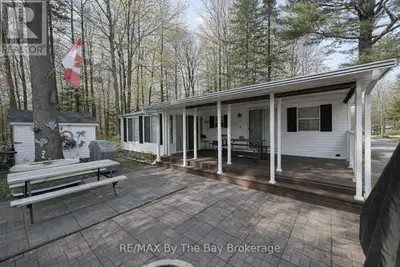 Northlander Cottager nestled within the serene beauty of Wasaga CountryLife Resort. This immaculatel...