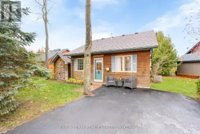 Top 5 Reasons You Will Love This Home: 1) Step into a warm and inviting cabin with cathedral ceiling...