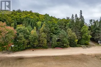 Pickerel Lake 4 seasons dwelling . 105 feet sand beach waterfront, beautiful sunset views. Lot acros...