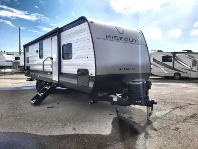 Keystone Hideout travel trailer 262BHS highlights: Front Private Bedroom 20' Power Awning with LED L...