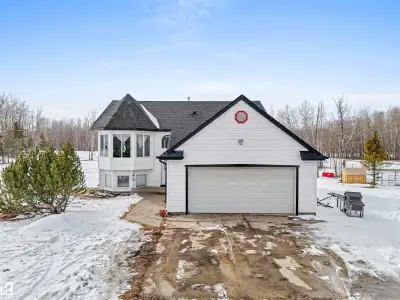 Discover an amazing 10.25 ACRES with HOME & SHOP, backing onto CROWN LAND just minutes outside of Dr...