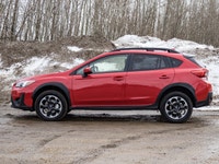 This Subaru is a versatile compact SUV built for both everyday driving and weekend adventures. With... (image 4)