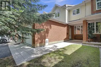 Claridge Sandpiper townhome in quiet area of Morgan's Grant with rare walkout basement to a pretty b...