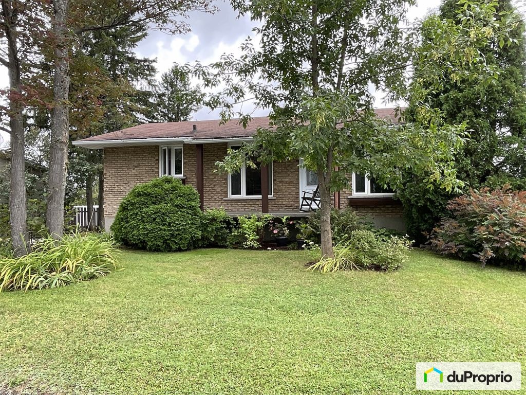 $318,000 - Bungalow for sale in Alma — photo 1