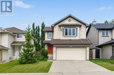 Nestled on a quiet street in the heart of Rocky Ridge, this impeccably maintained family home sits j...