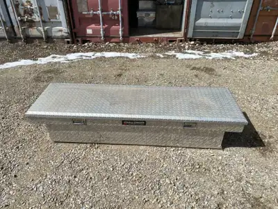 Challenger top rail aluminum tool box. Front opening.In good condition .. No Keys 69.5 inches across...