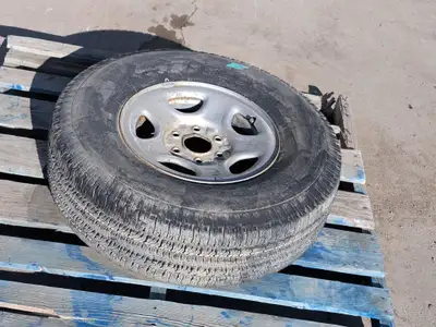 (1) Firestone Wilderness AT P265/75R16 Tire with 6 Bolt Steel Rim FIRESTONE WILDERNESS AT