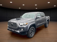 The 2023 Toyota Tacoma TRD Sport V6 in stunning gray is ready to tackle any terrain with its robust... (image 1)