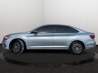 This Volkswagen Jetta has a powerful Intercooled Turbo Regular Unleaded I-4 1.4 L/85 engine powering... (image 1)