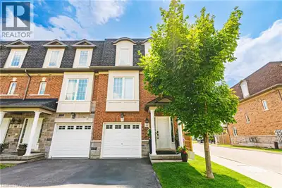 Welcome to 2220 Queensway Drive # 4. This exceptional end-unit townhome is sure to impress! Boasting...