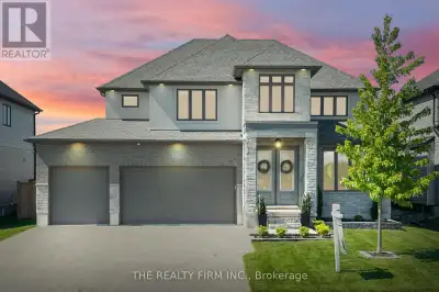 Welcome to 6520 Crown Grant Road, a beautifully upgraded former model home located in the sought-aft...